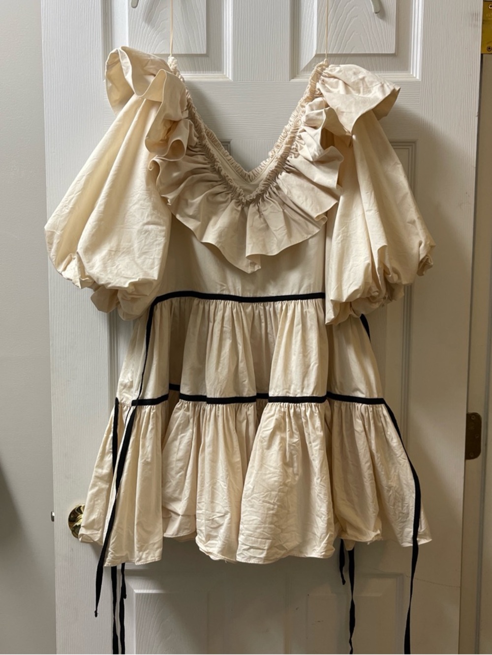 vestique Cream Ruffled V‑Neck Peasant Dress with Black Trim